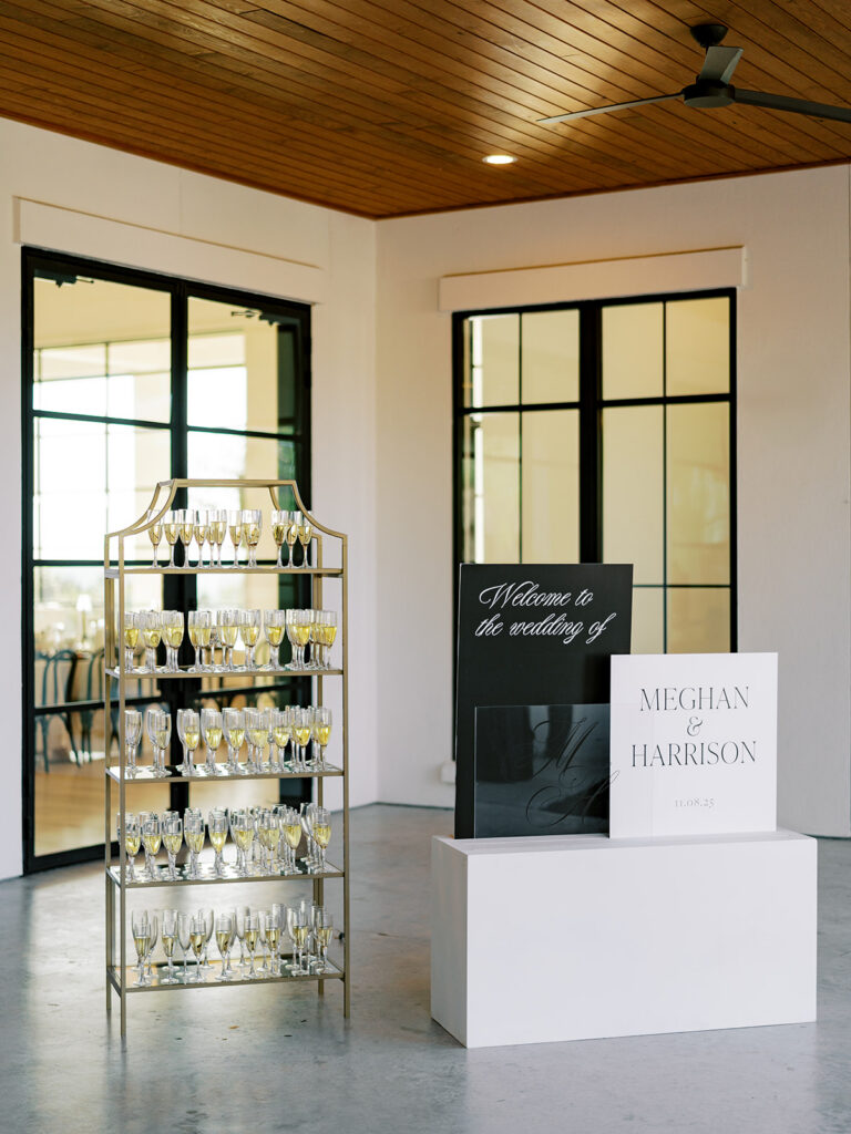 Black and white wedding signage at a classic wedding