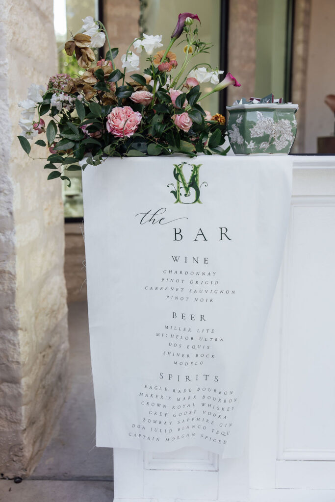 Linen bar signs are a favorite, they drape perfectly and add visual interest