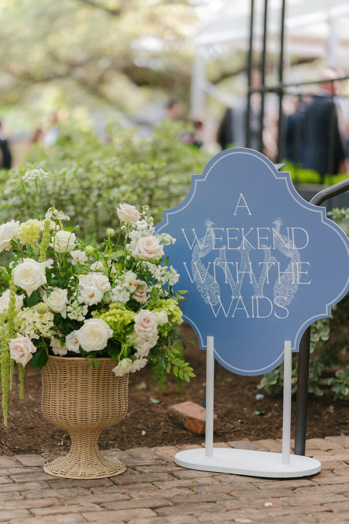 Blue and white welcome sign